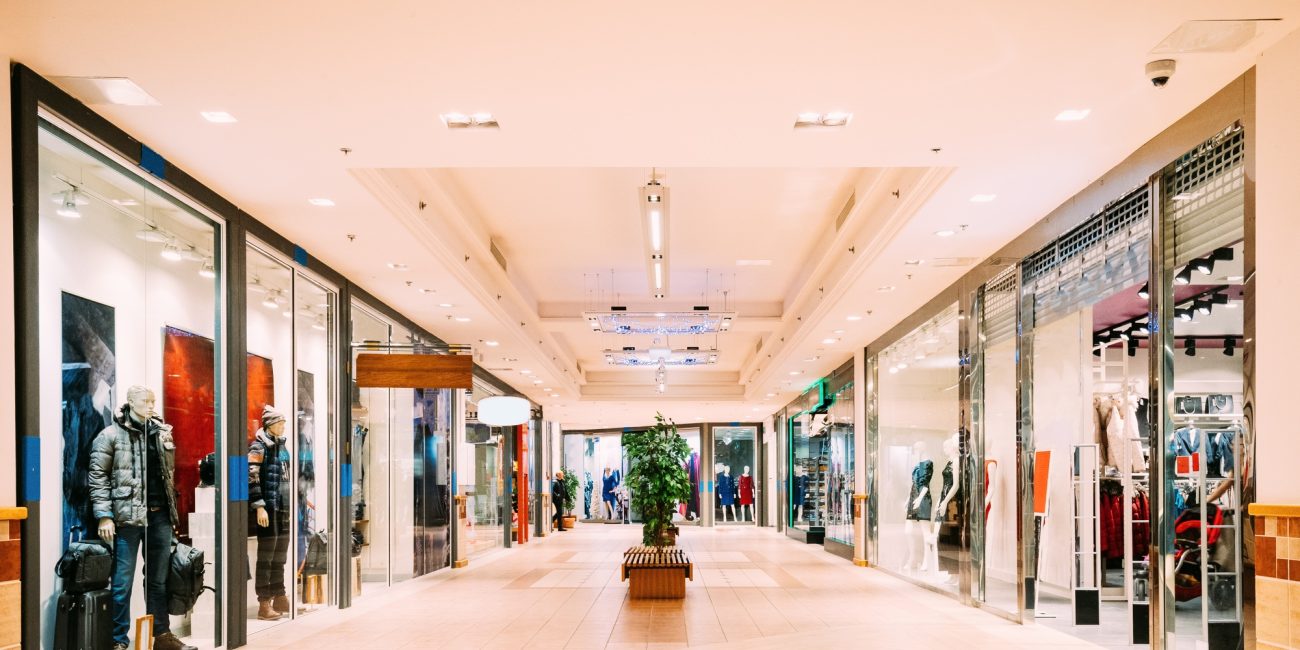 Shops with clothes at the modern shopping mall Shopping Centre